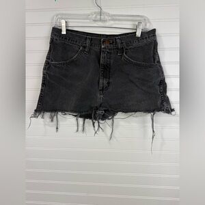 Rustler women’s black faded denim cutoff shorts. Size 30.